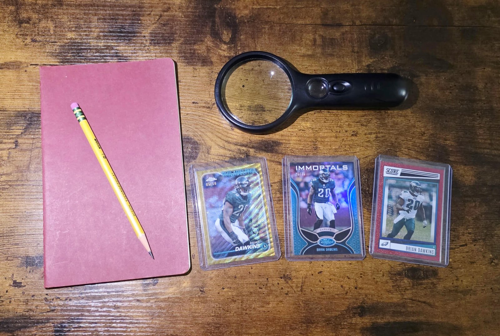 Background image of a sports card collection